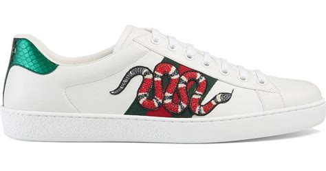 gucci ace embroidered snake.